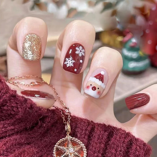 24Pcs Christmas Fake Nails Short Square Press on Nails Cute Santa Claus Glue on Nails Winter Snowflake False Nails Gold Glitter Full Cover Coffin Christmas Acrylic Nails for Women Manicure Decoration